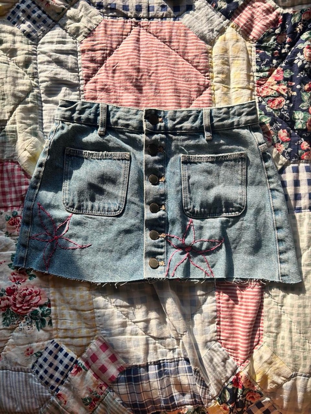 Light Wash Denim Button-Front Mini Skirt with Pink Embroidery